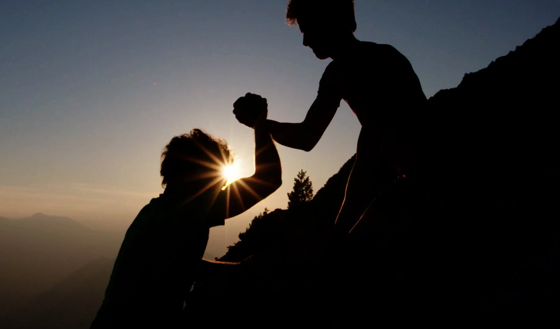 A hand extended in support — Stronger Roots Housing